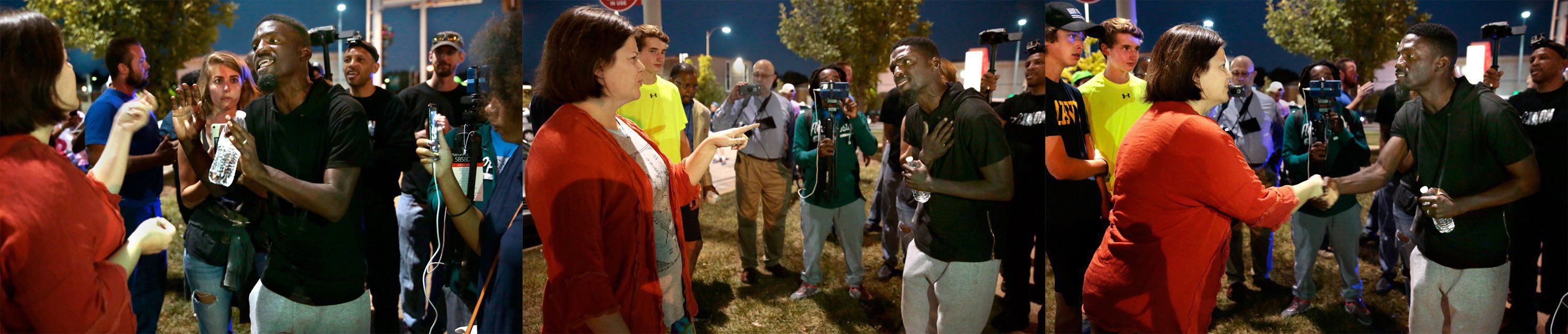 State Rep. Bruce Franks Jr. debates a woman outside of police union hall during a protest march